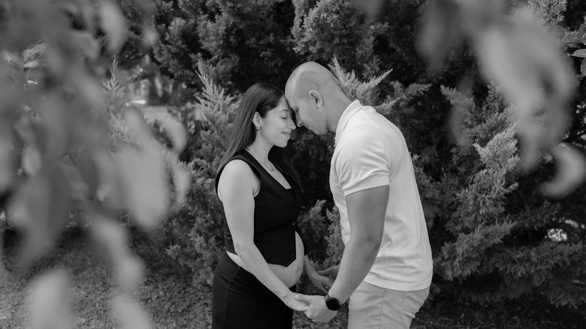 A man and a woman standing next to each other
